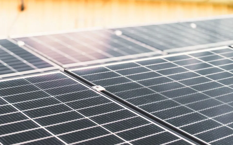 The cells and busbars of a solar panel, close.
